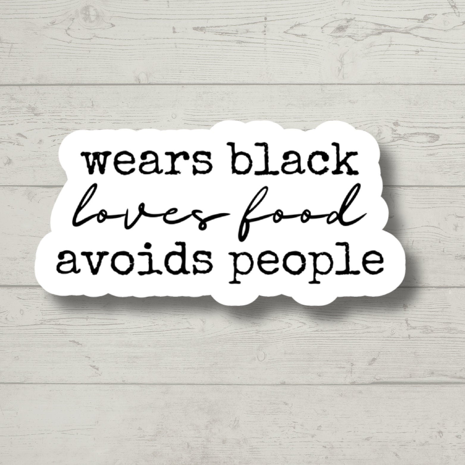 wears black loves food avoids people